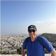 Experienced English teacher guiding learners to speak fluently